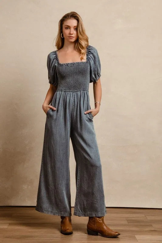 BiBi Smocked Washed Puff Sleeve Square Neck Denim Jumpsuit - Codrington Expressions