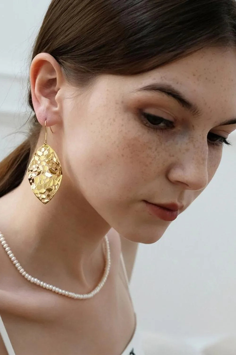 Brass Cutout Leaf Shape Earrings - Codrington Expressions