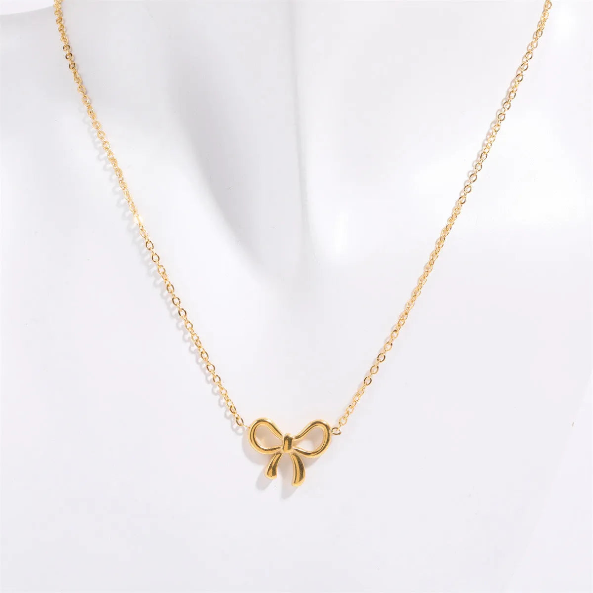 Titanium Steel Bow Pendant Necklace - Codrington Expressions