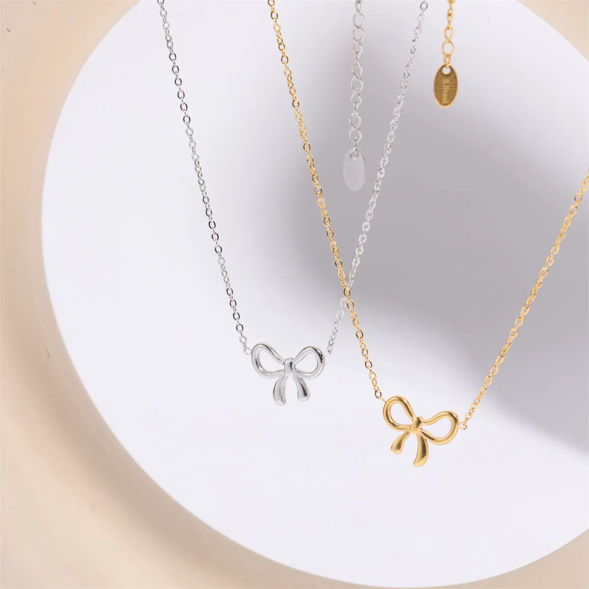 Titanium Steel Bow Pendant Necklace - Codrington Expressions